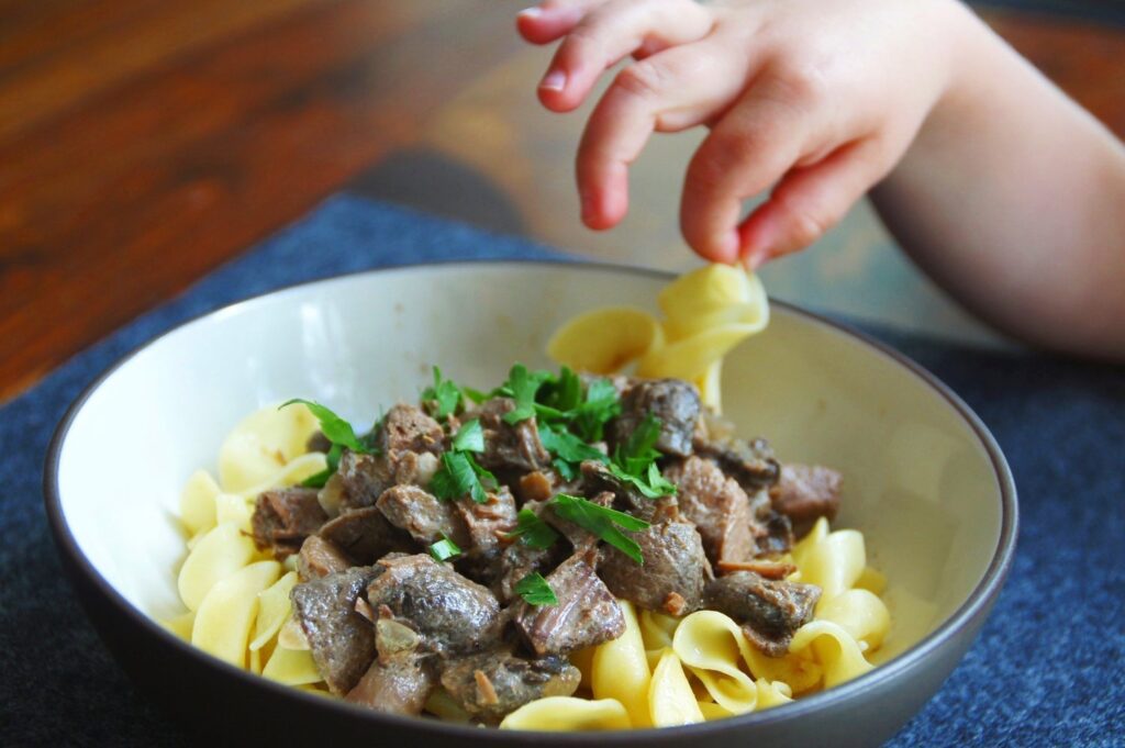 Little hands ready to eat!