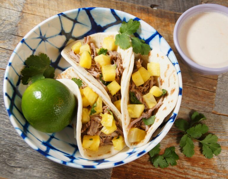 Crockpot Pulled Pork Tacos with Pineapple Salsa and Chipotle Lime Crema