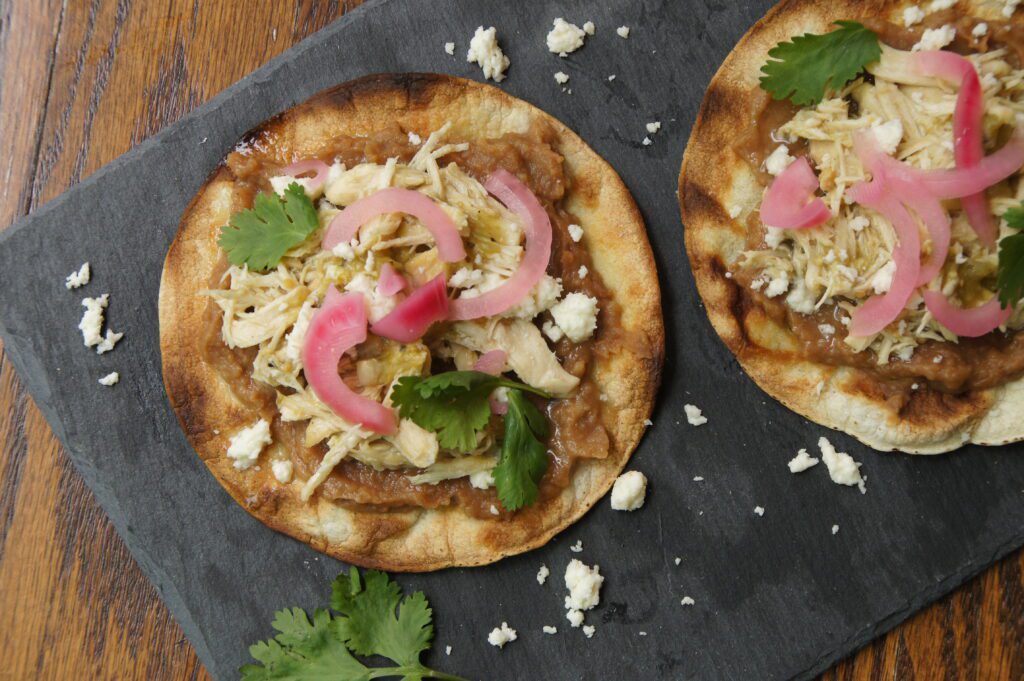 Crockpot Salsa Verde Chicken Tostadas