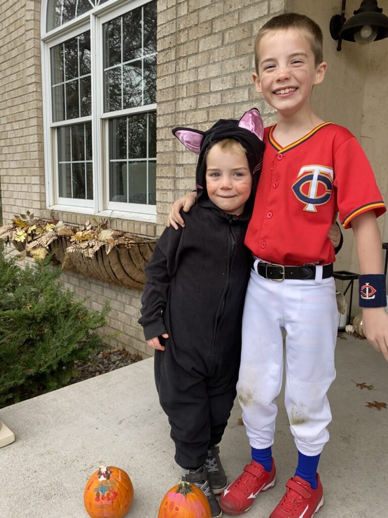 The cutest kitty and baseball player!