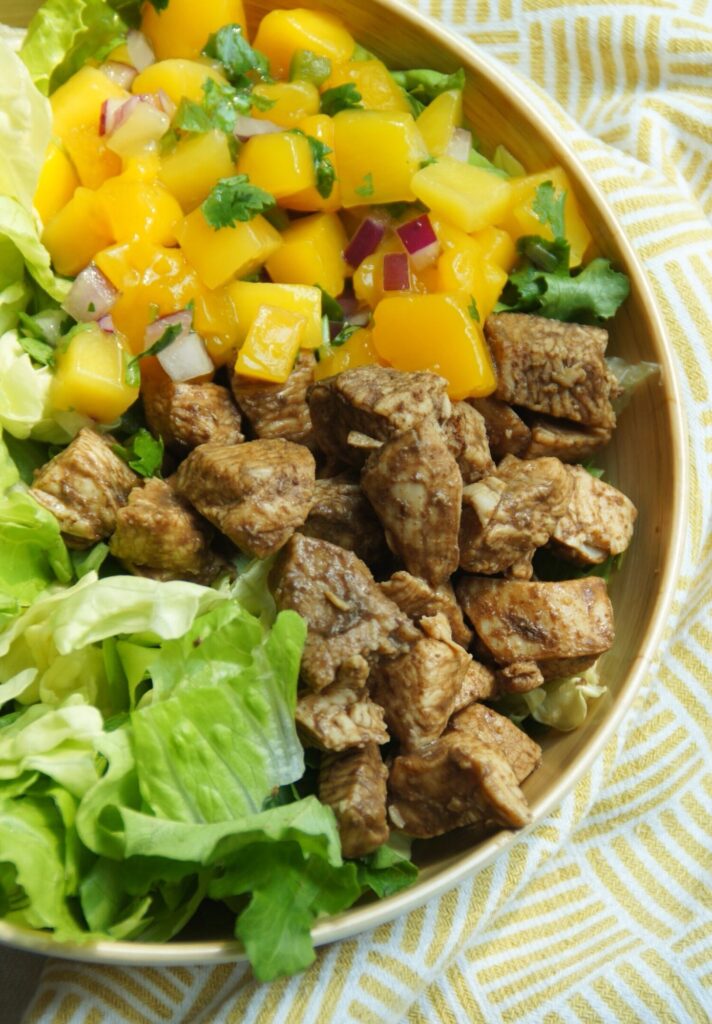 A delicious mango salsa on top of the salad!